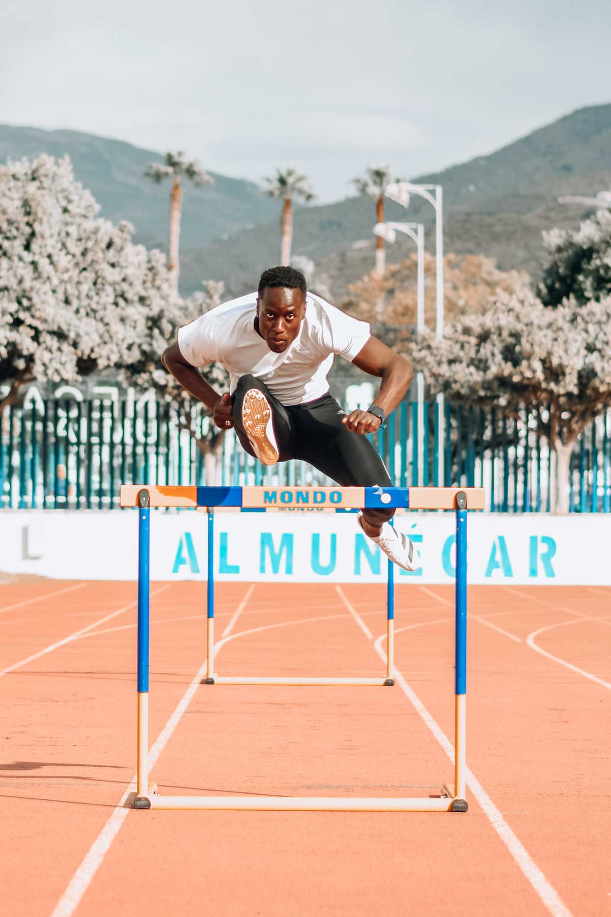Athlete Jumping over hurdles